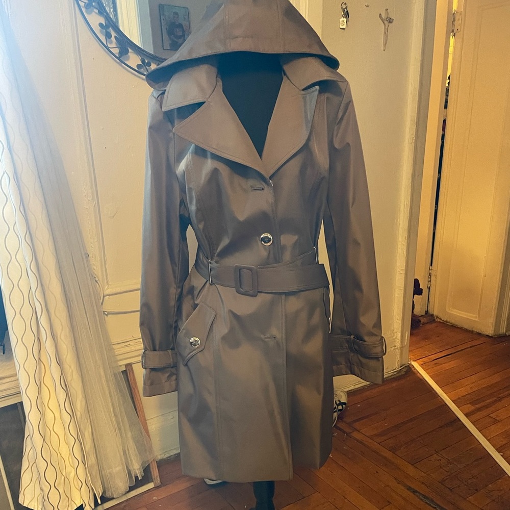 Women’s Calvin Klein trench jacket with hood.  Perfect for the Fall.